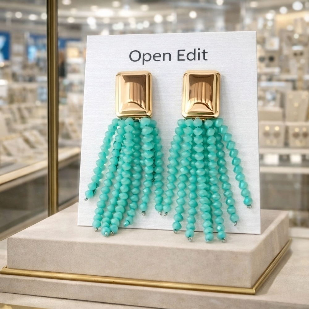 Women's gold beaded tassel earrings